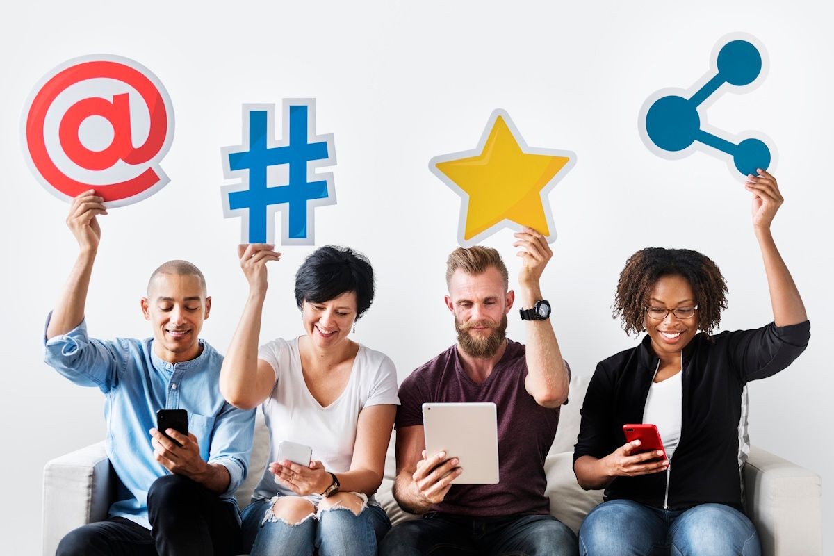 social media icons held up by workers
